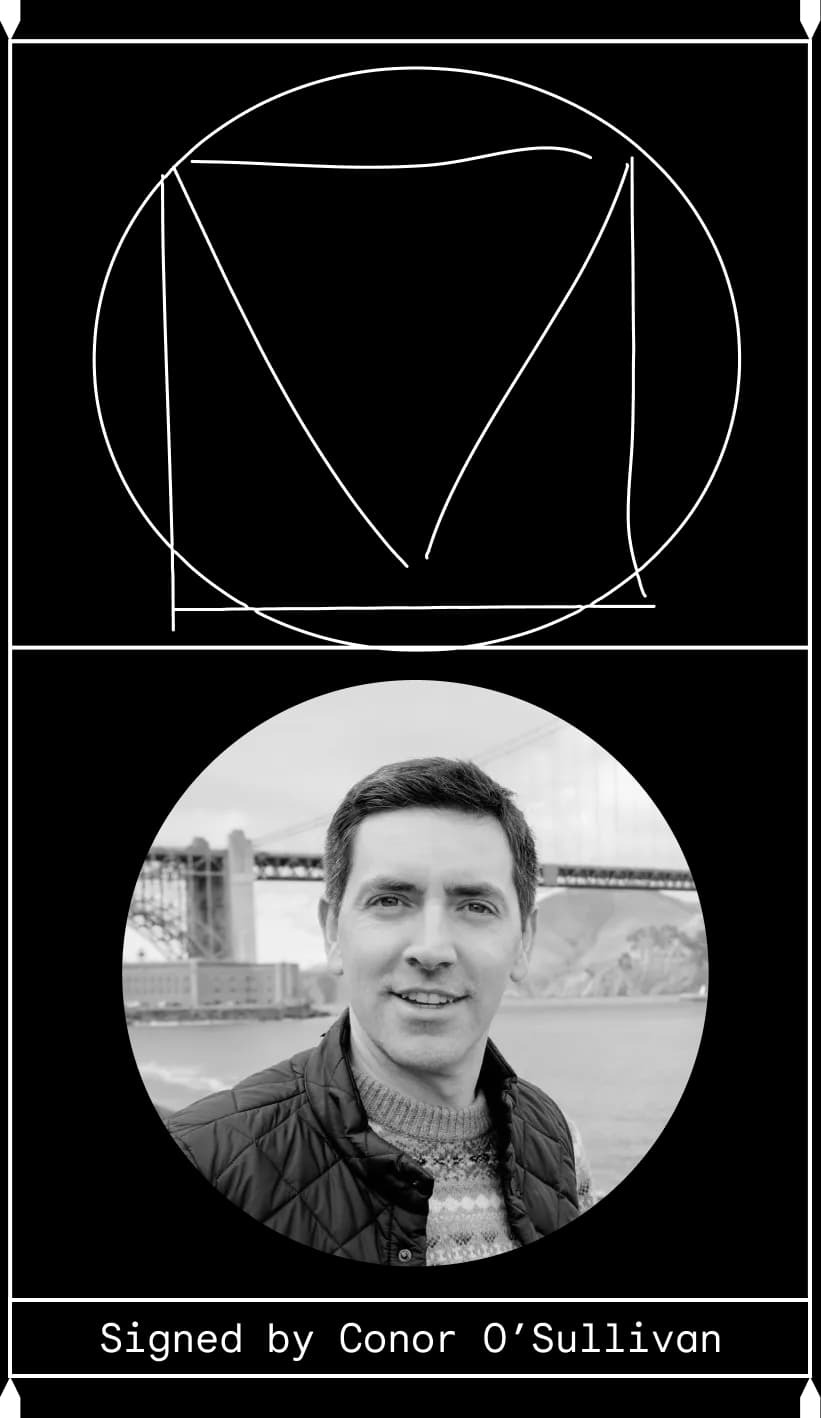 Sketched "M" looking like the Material Design logo above a nice young man. Signed by Conor O'Sullivan.
