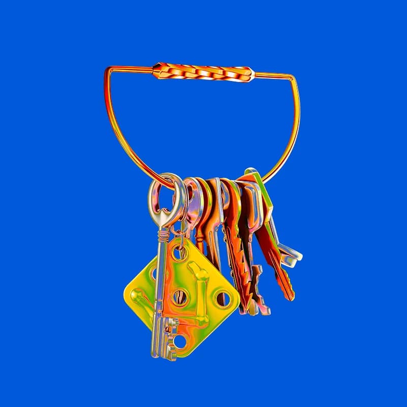 Colorful, metallic keys dangle from a twisted-wire key ring against a vibrant blue backdrop.