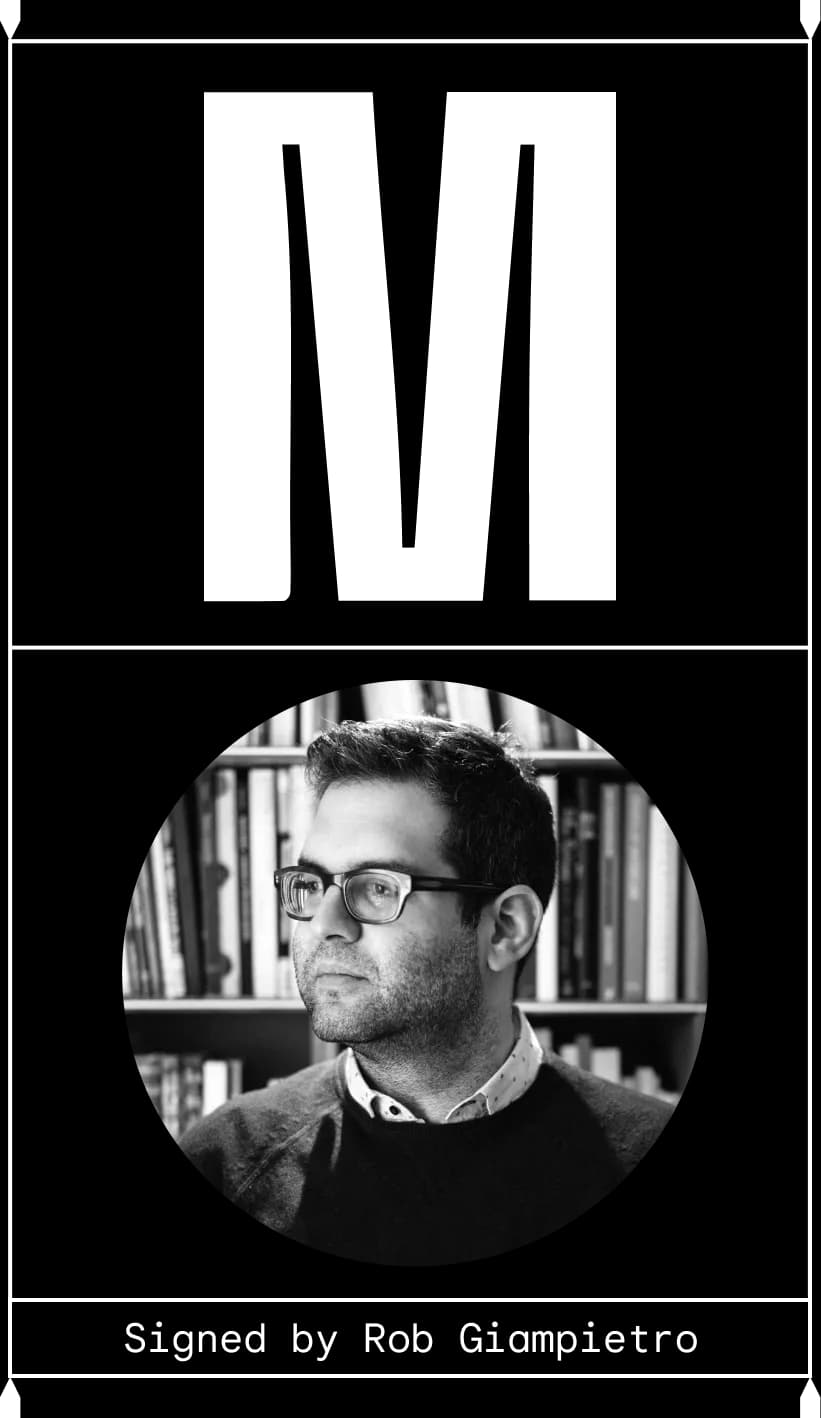 Blocky brutalist "M" above a man with glasses looking off into the future. Signed by Rob Giampietro.