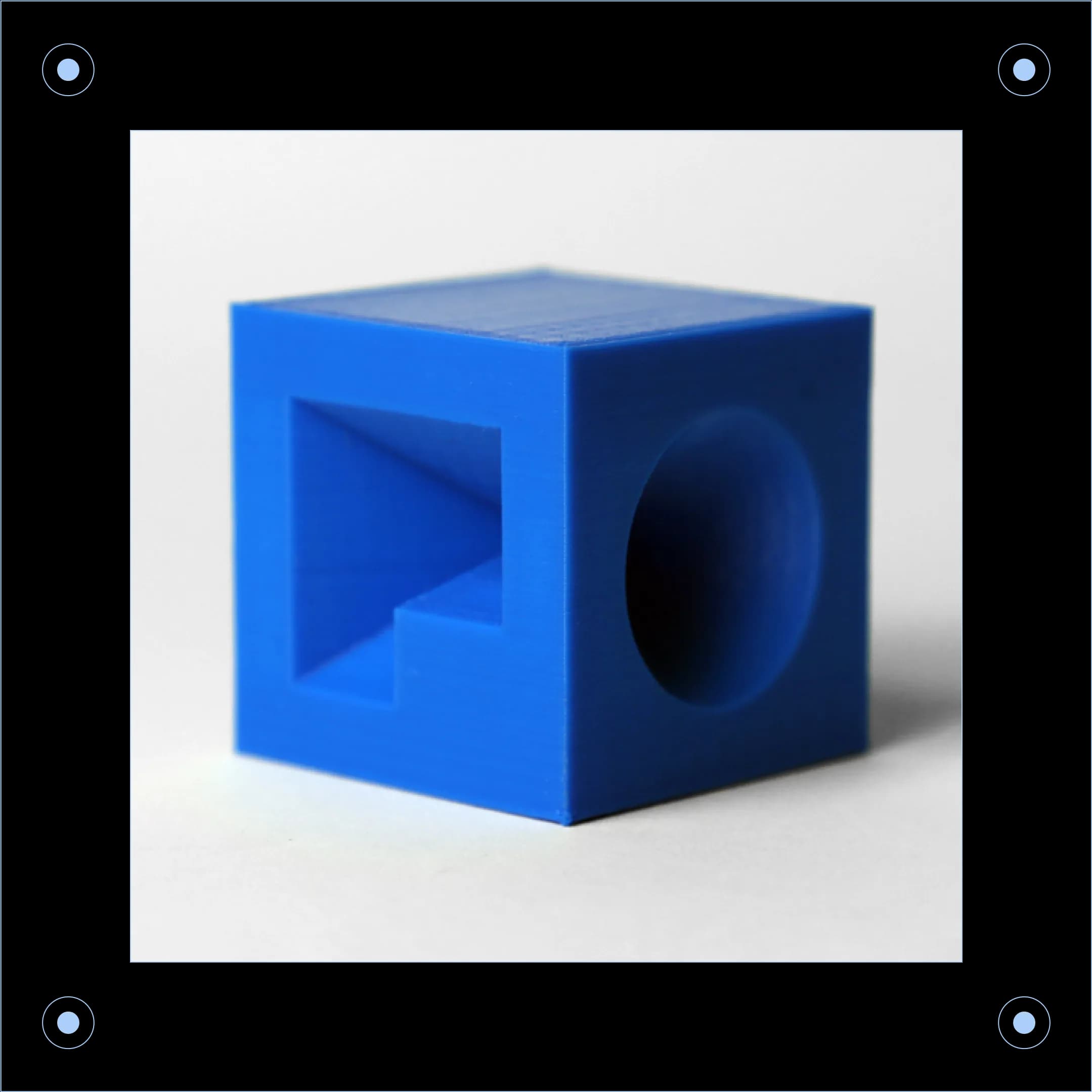 Close-up of a bright blue cube with the letters "F" and "O" visible.