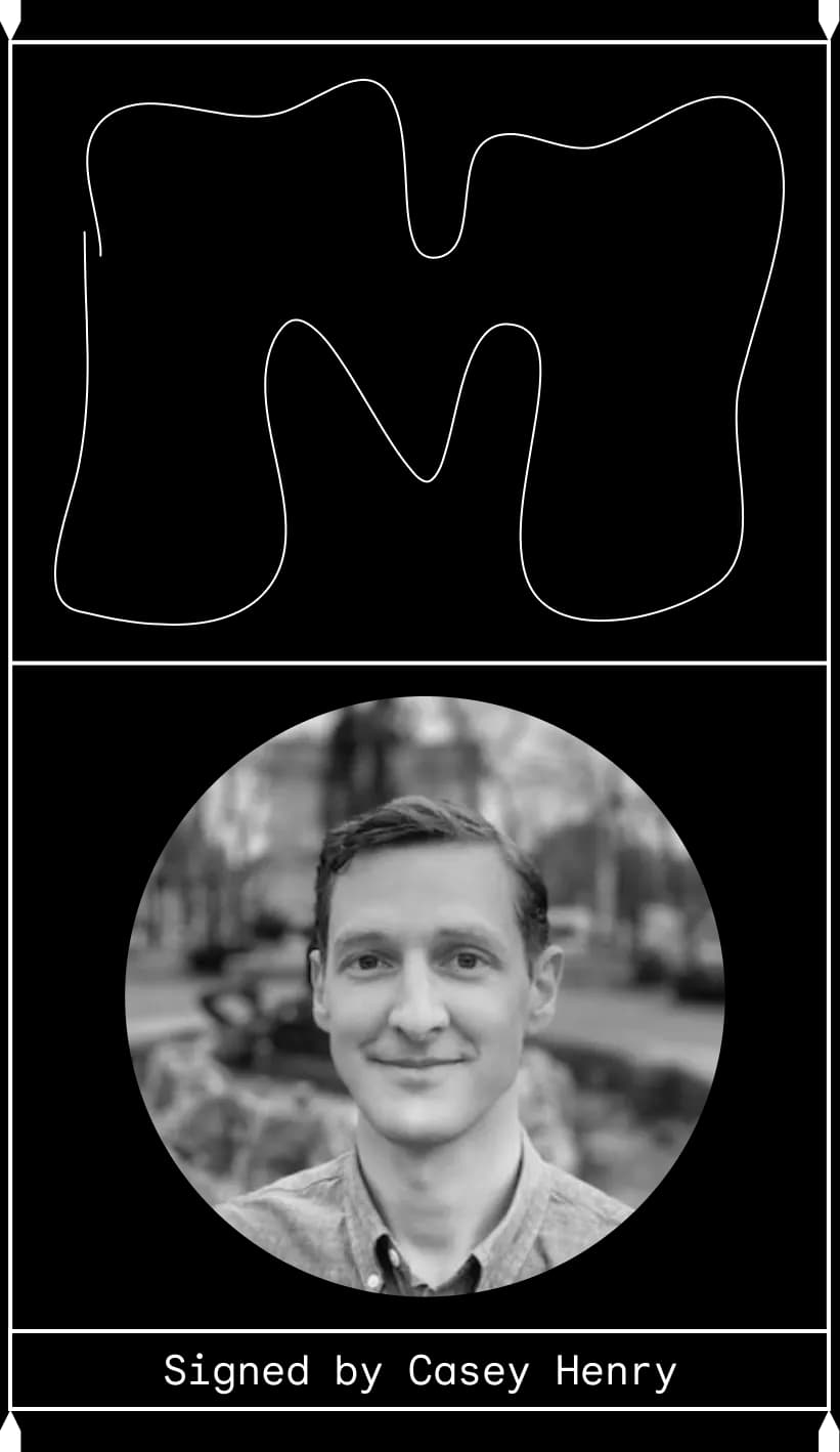 Doodle-like "M" above a studious young man. Signed by Casey Henry.