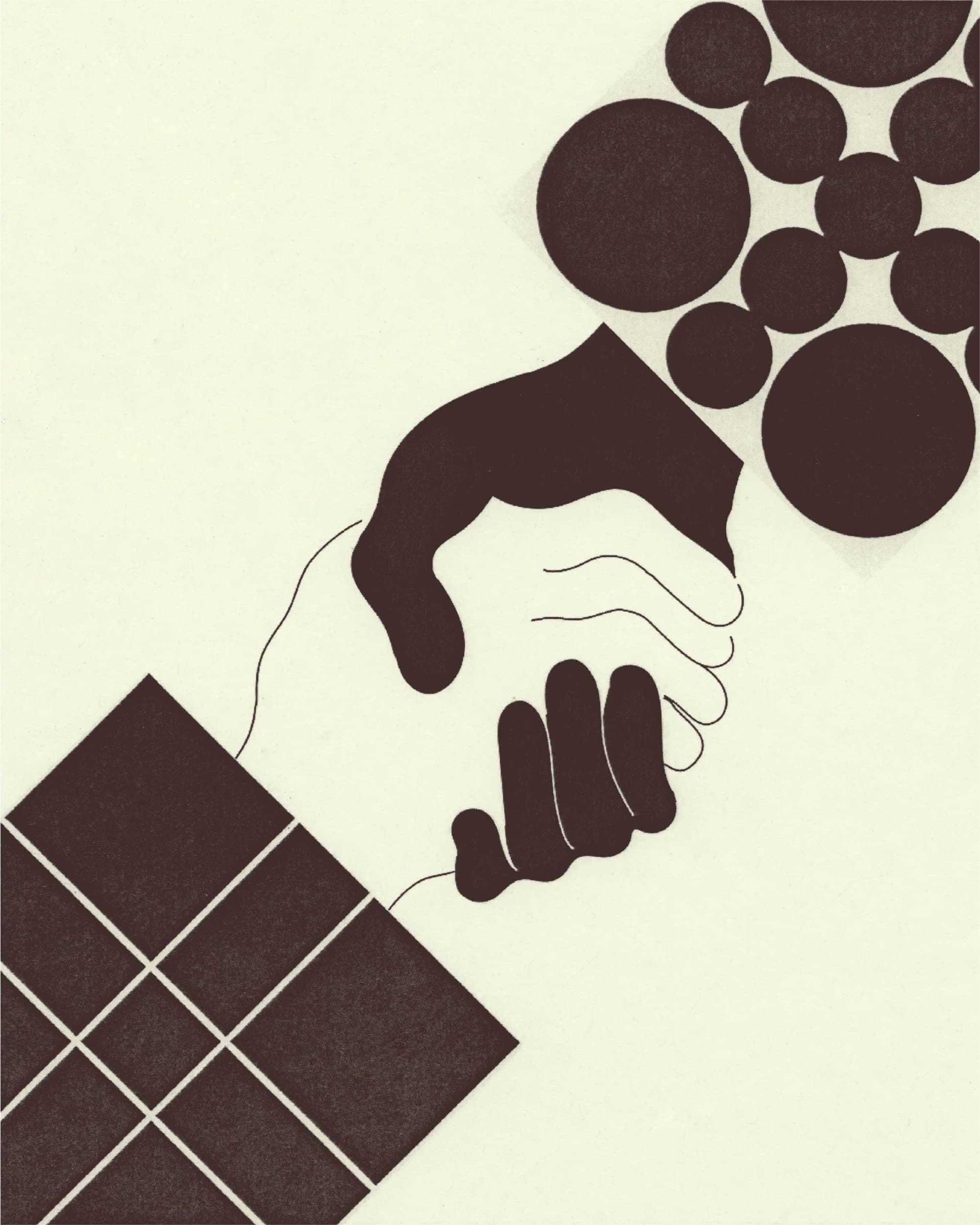 Two hands clasp in a handshake.