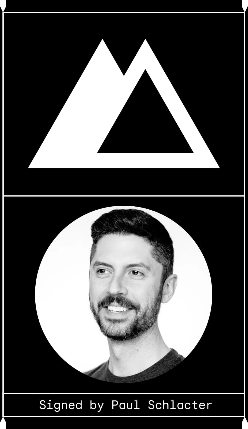 Mountain-like "M" above a dapper smiling man. Signed by Paul Schlacter.
