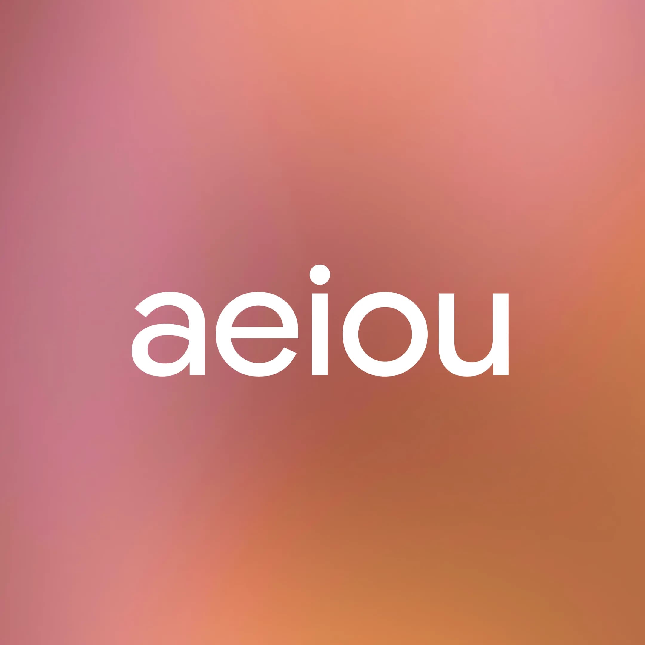 The lowercase vowels a, e, i, o, and u in white Google Sans Flex text centered on a soft, muted pink-and-orange-gradient background