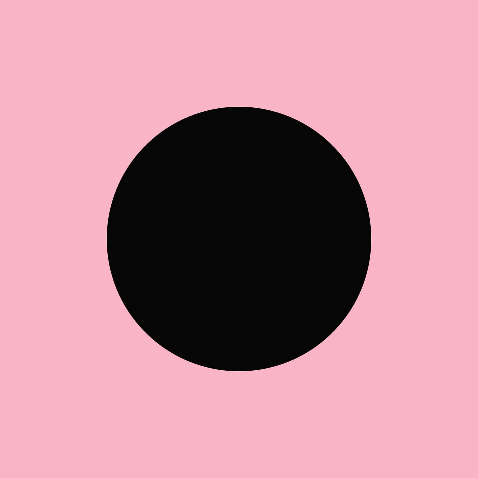 A black circle on a pink background.