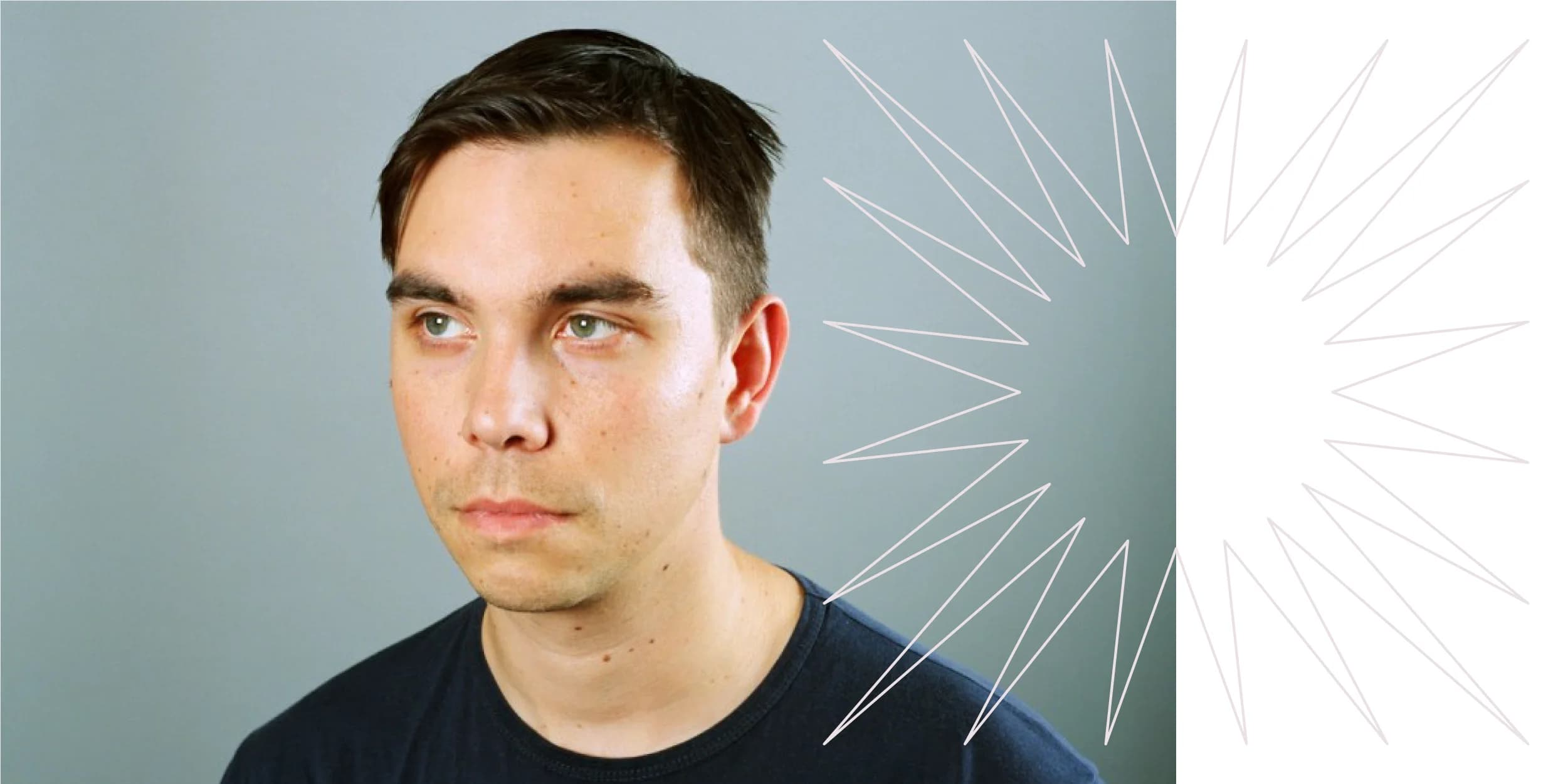 Headshot of a person with short brown hair, looking off to the side.
