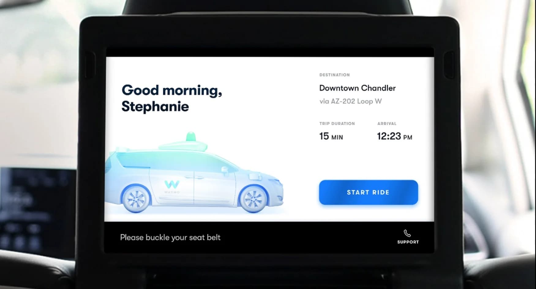 A screen inside a Waymo self-driving vehicle. It displays the destination, trip duration, arrival time, and a "Start Ride" button.