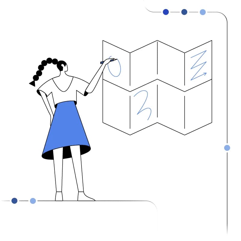 A person with a ponytail draws on a large map with a marker.