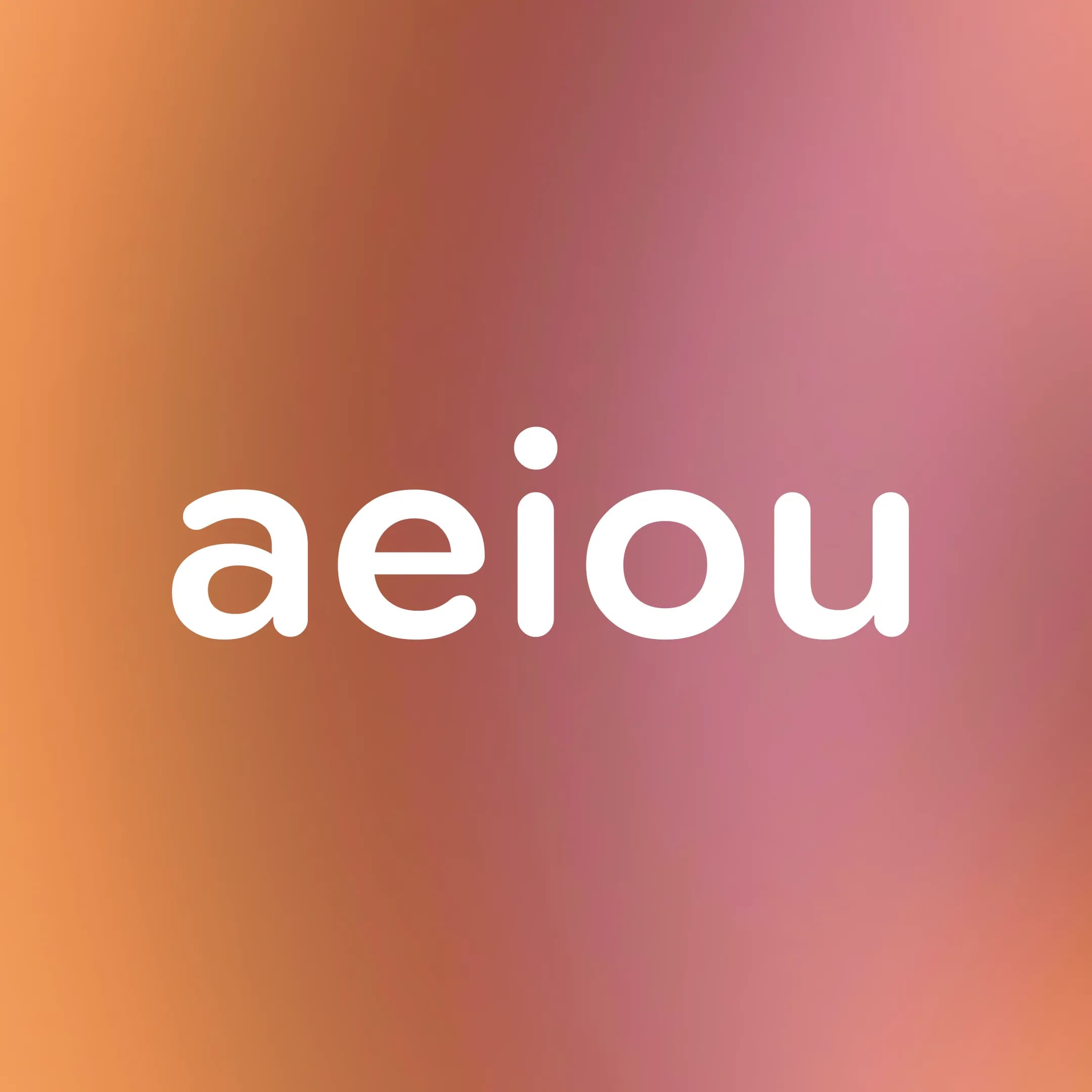The lowercase vowels a, e, i, o, and u in white text centered on a soft, muted orange-and-purple gradient background. There is increased letter spacing compared to the image on the left.